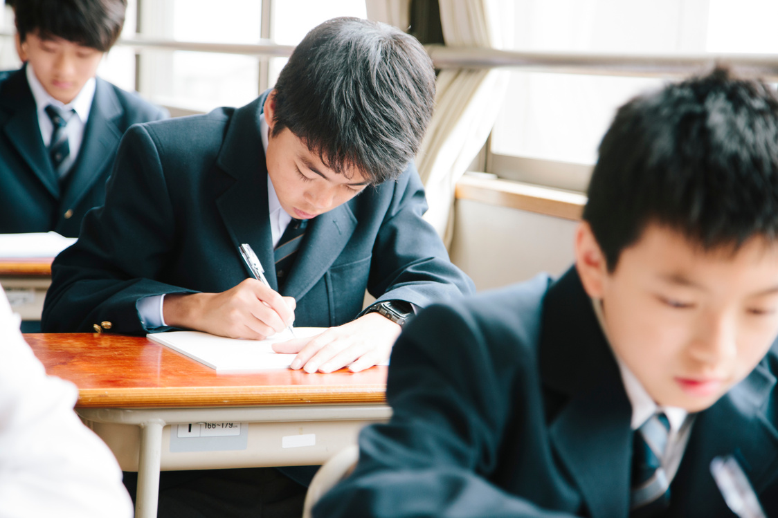 High school students, young male students working in classroom, Japan